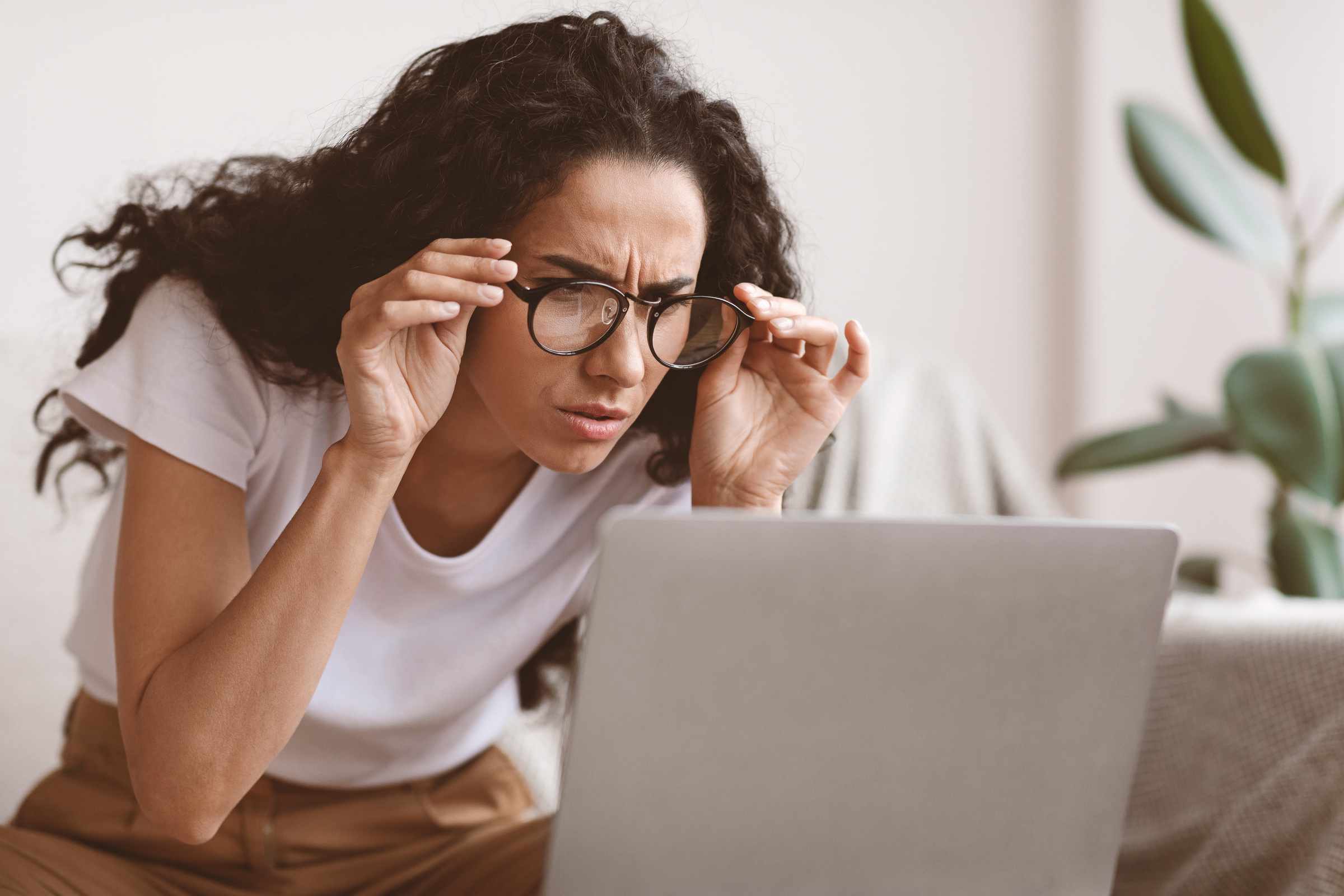 Person sorting through documents to trace a lost life insurance policy
