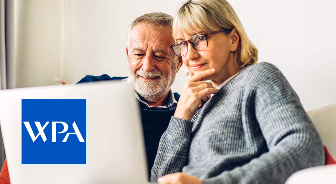Older couple looking at a laptop together, with the WPA logo.
