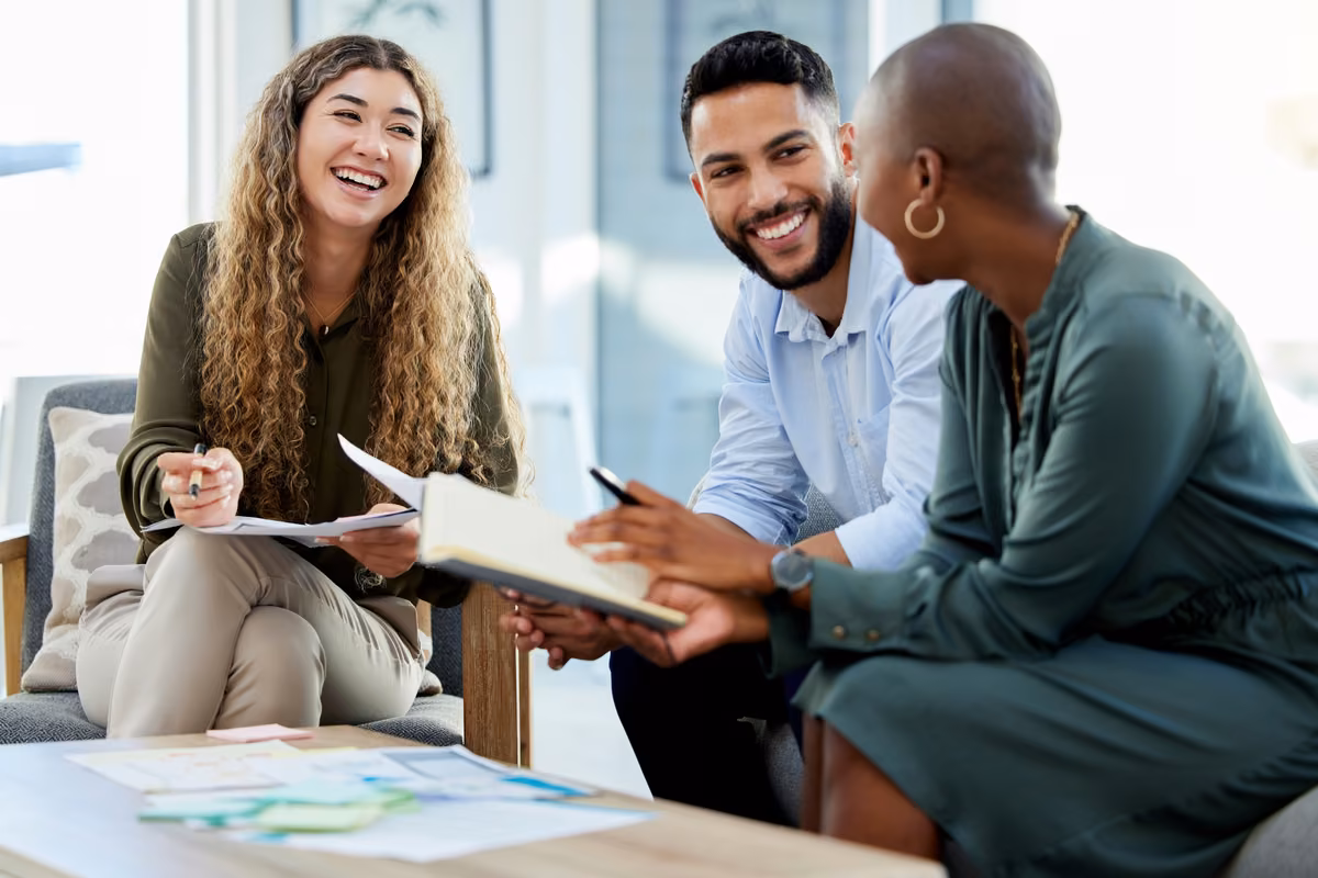 Employee reviewing death in service benefit and life insurance documents at work