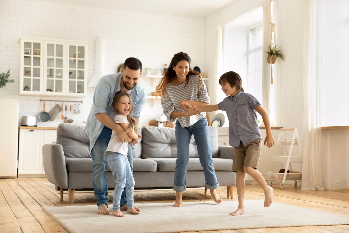 Young family at home learning how family income benefit provides a regular income