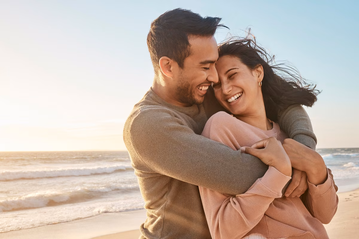 Couple reviewing the details of a joint life insurance policy at home