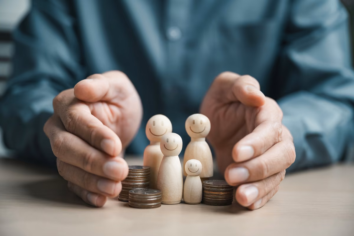 Couple discussing placing their life insurance in trust with an adviser