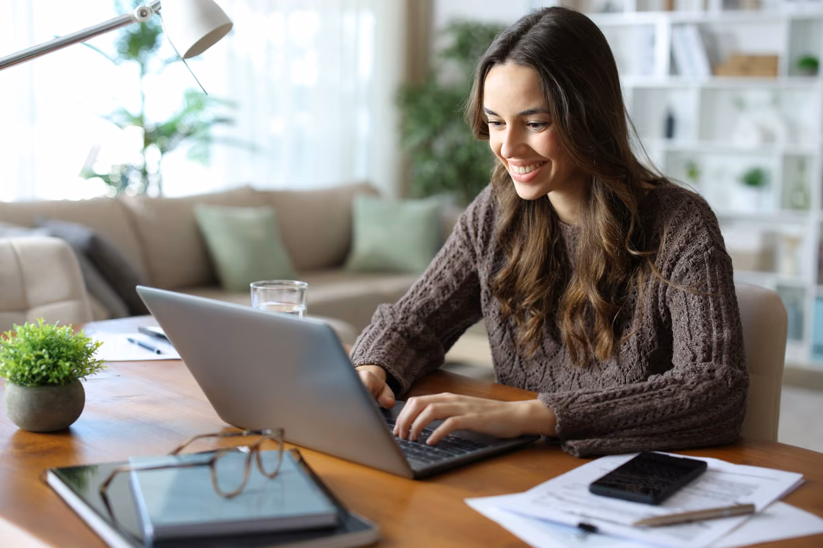 Underwriter assessing a life insurance application at an office desk