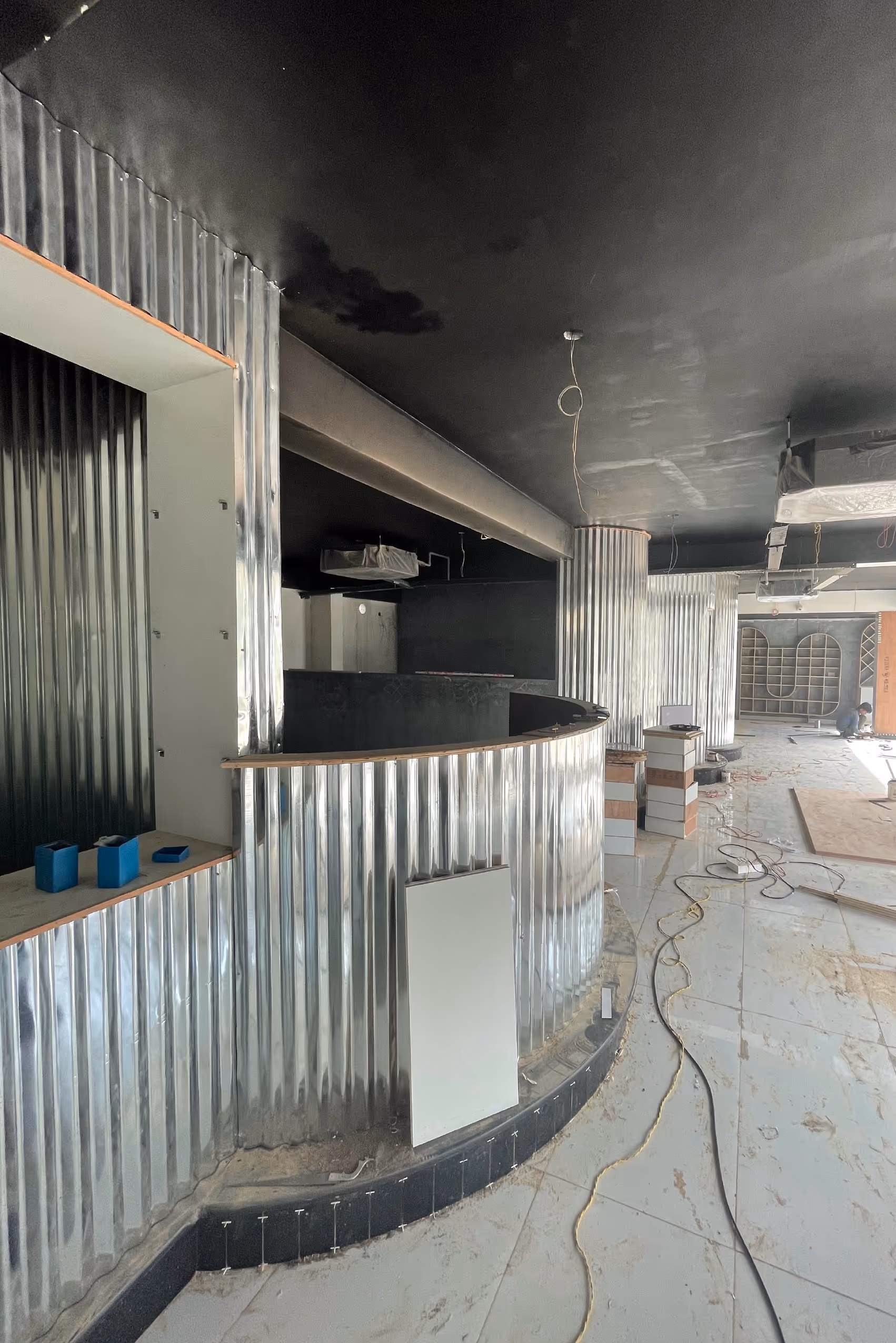 walls cladded with tin roofing sheets