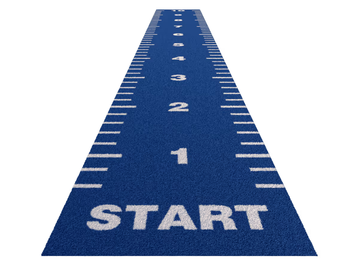 Blue running track starting line with white number markings from 1 to 10.
