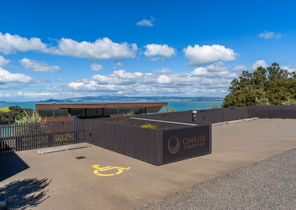 Omana Luxury Villa's car park, with EV charger
