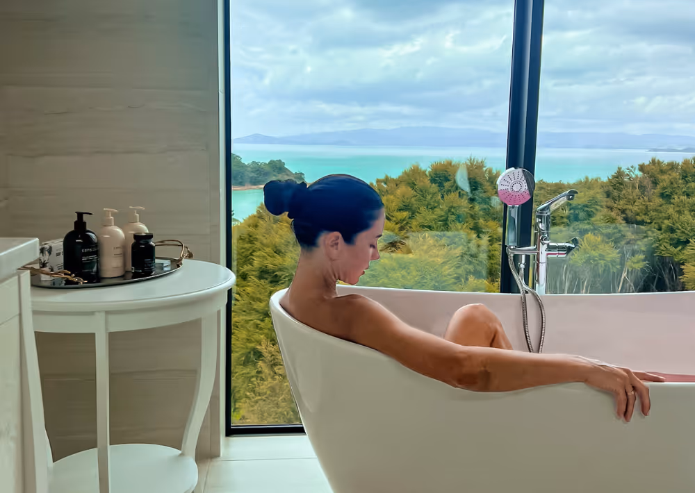 Relaxing in a bath tub with an ocean view on Waiheke Island