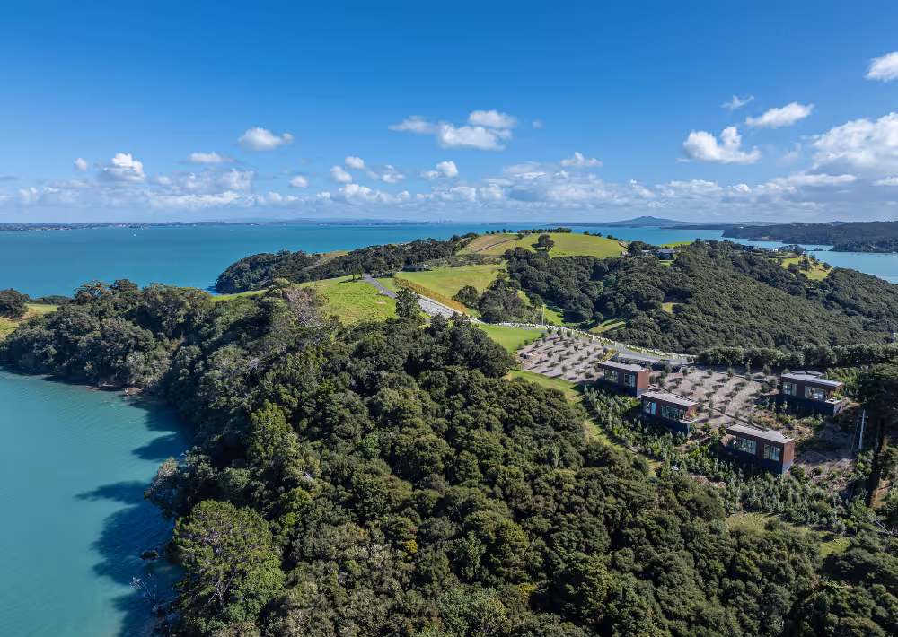Aerial picture of a boutique hotel on Waiheke Island, surrounded by stunning sea views
