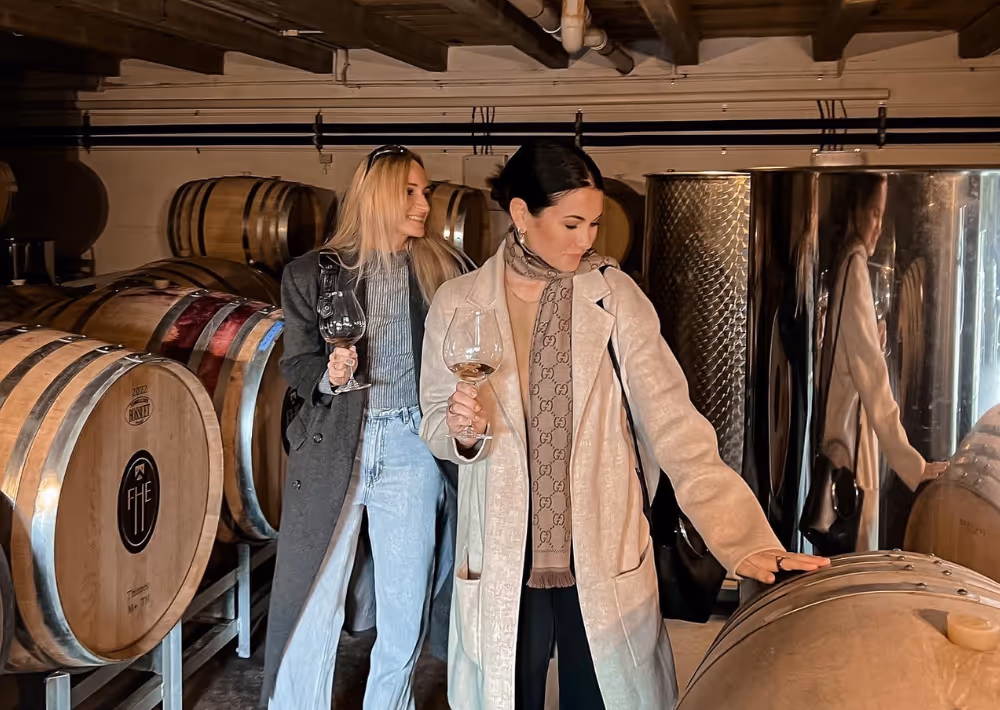 Two women at a wine tasting experience on Waiheke Island