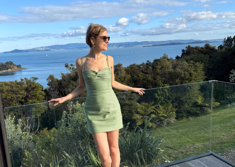 A guest relaxes on the balcony at Omana boutique hotel