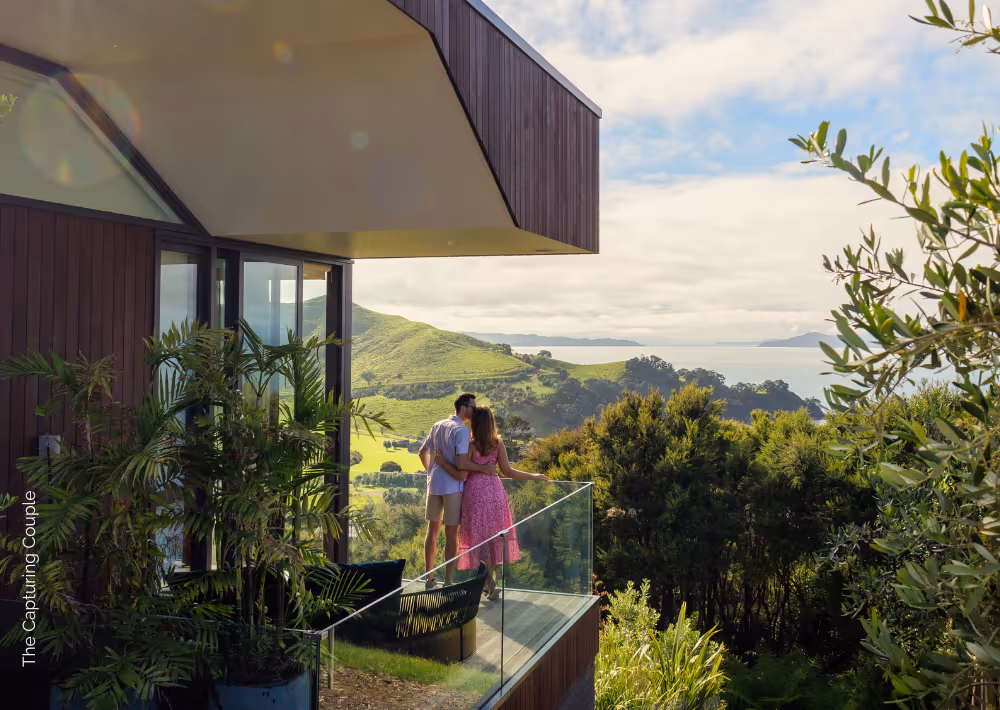 A couple marvels at Omana's stunning views