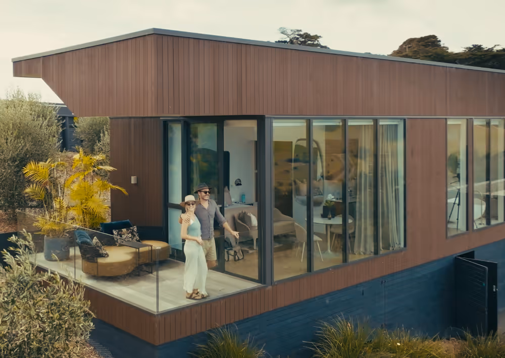 A couple enjoys the exclusive view from Omana's balcony