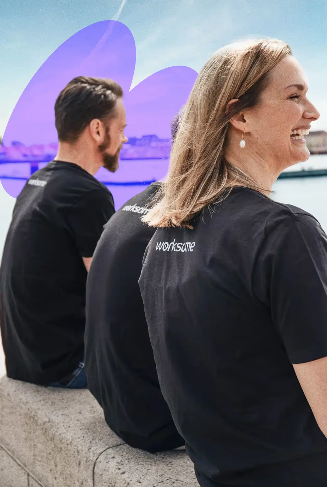 The C.E.O, C.C.O, C.P.O sitting in front of the sea with a worksome tee-shirt
