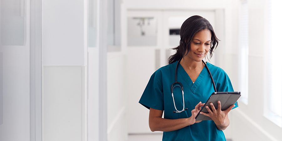 Doctor reviewing information on an ipad