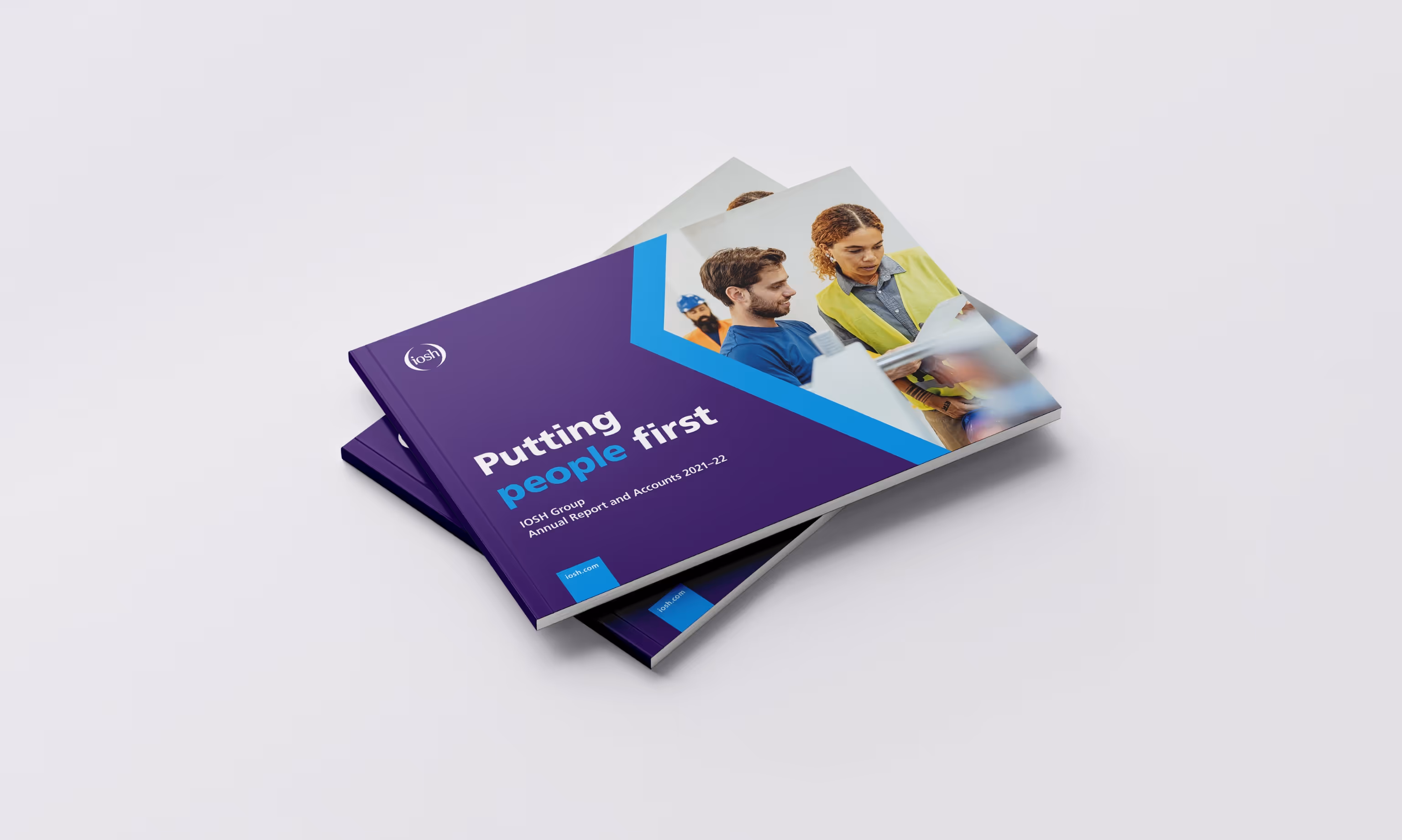 Annual report cover showing two people working together.