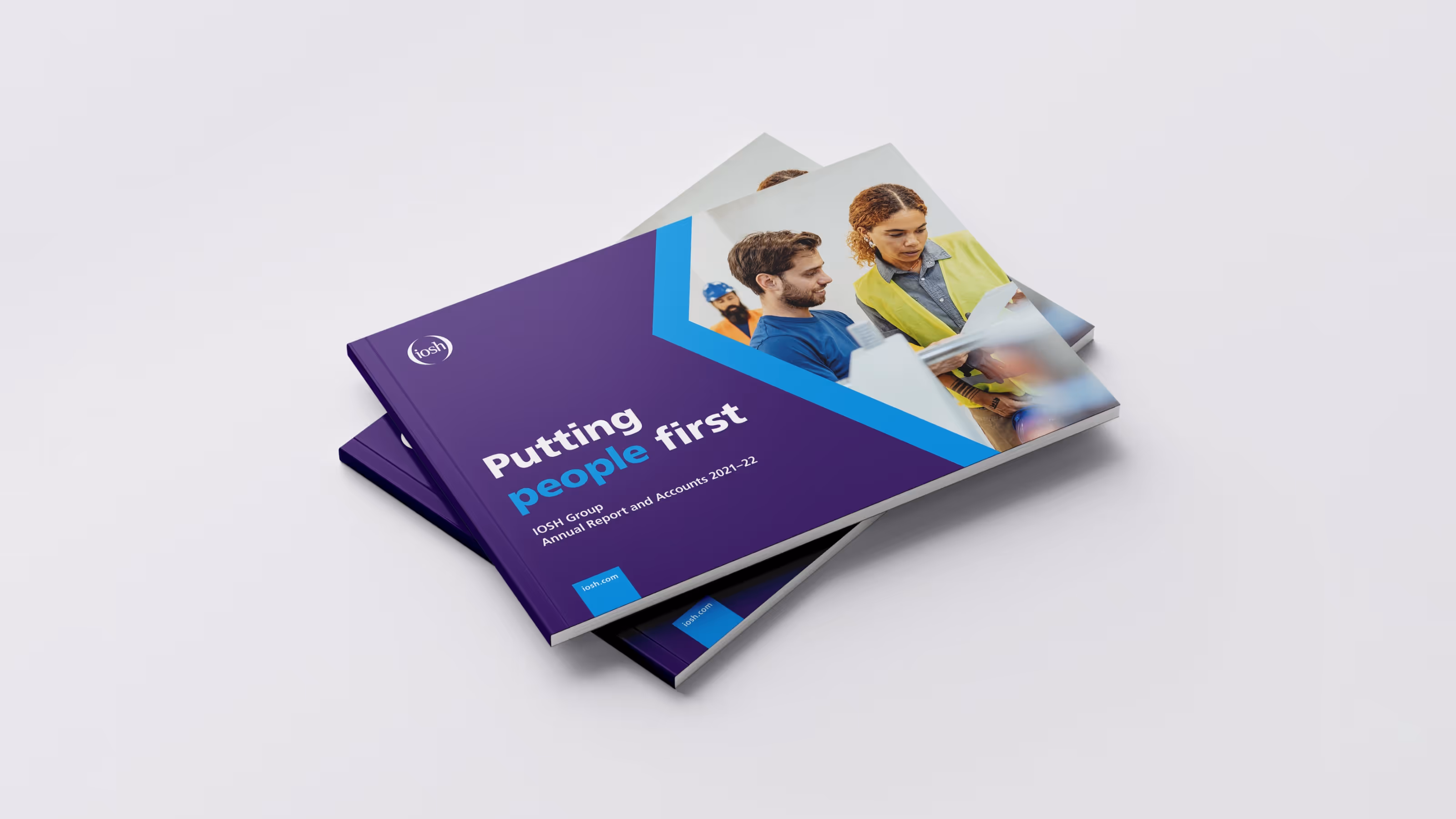 Annual report cover showing two people working together.