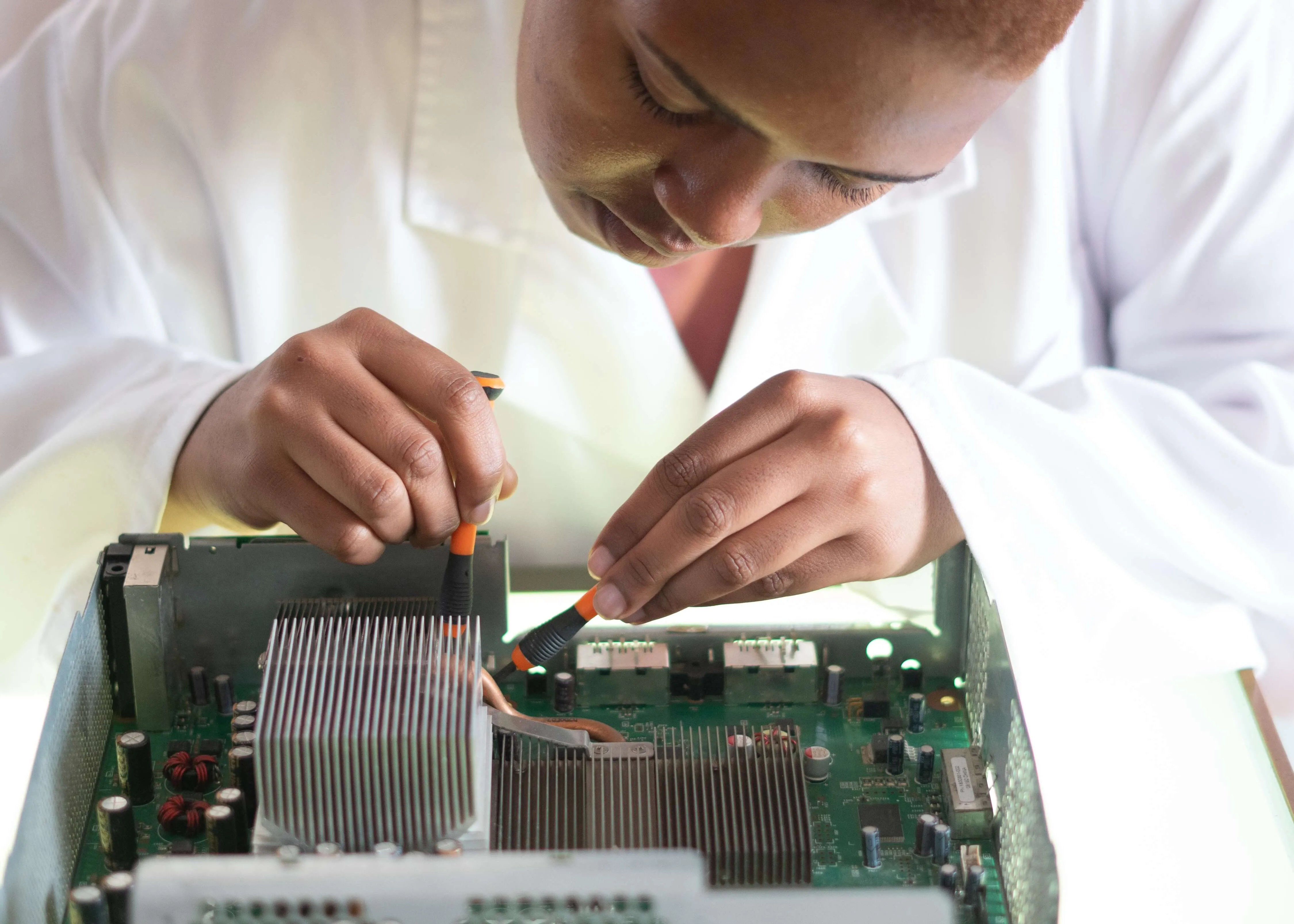 woman fixing a si wafer