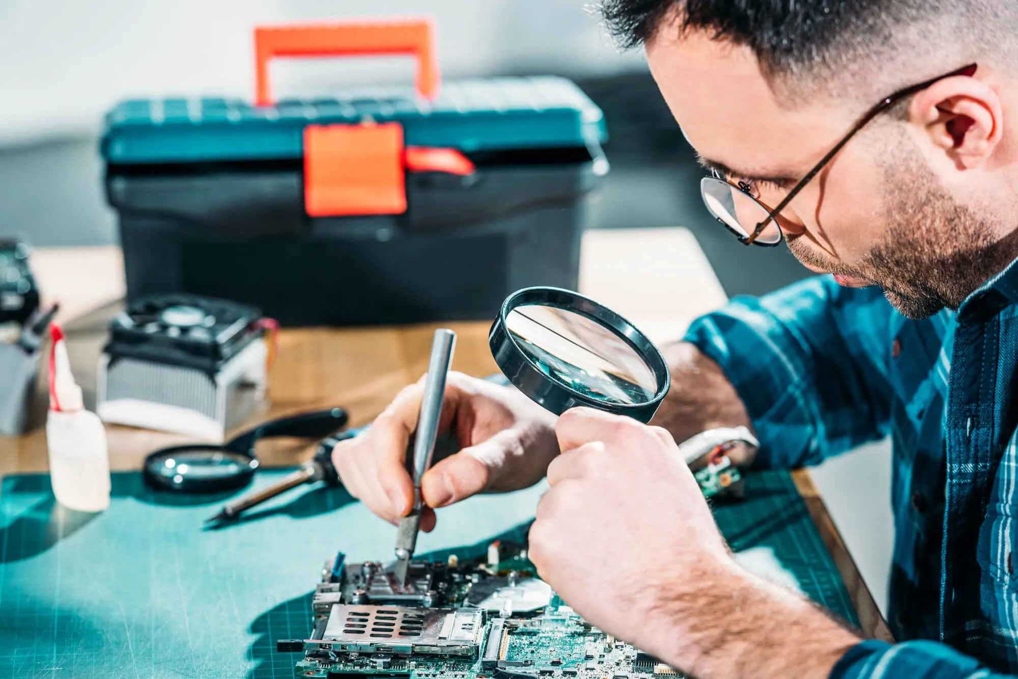 Man checking a thin silicon wafer
