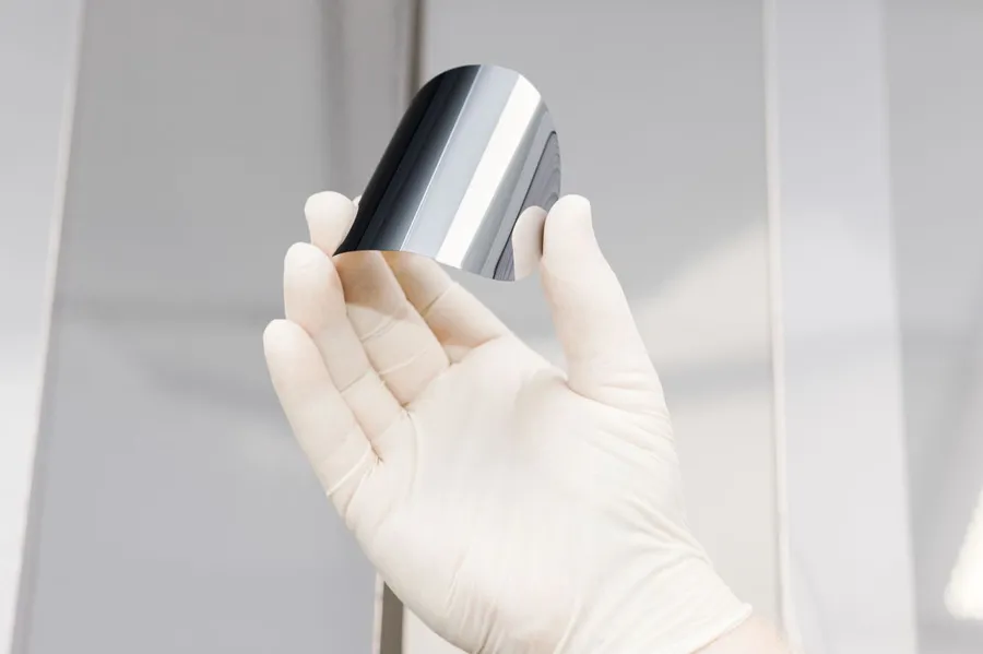 silicon-wafer-inspection-gloved-hand-semiconductor