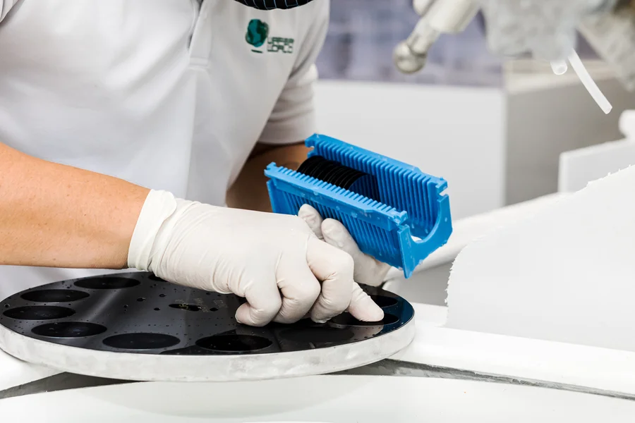 ultra-flat-wafers-technician-loading-semiconductor-wafers-into-carrier