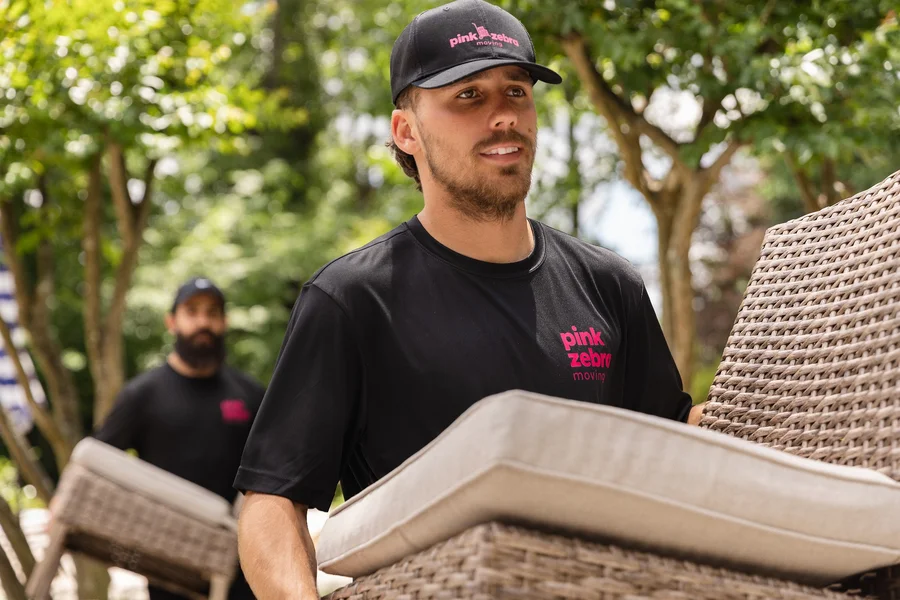 professional-movers-carrying-patio-furniture-carmel-indiana