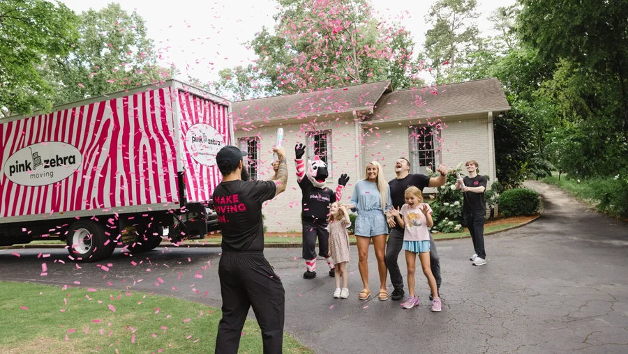family-celebrating-move-with-pink-zebra-moving-team-chagrin-falls-ohio