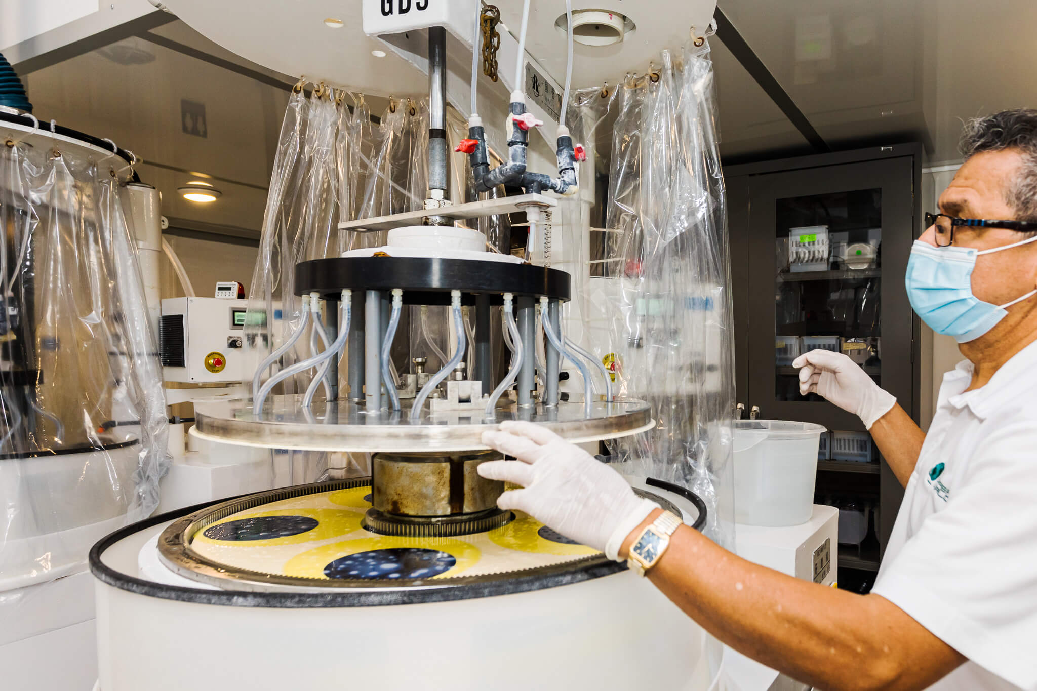 Man auditing silicon wafer processing