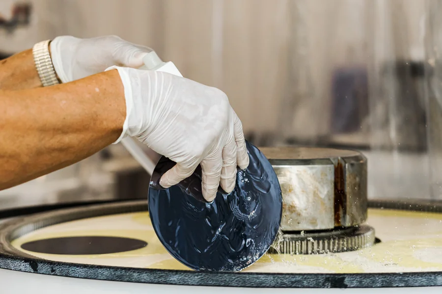 gaas-wafer-technician-handling-gallium-arsenide-wafer-during-polishing