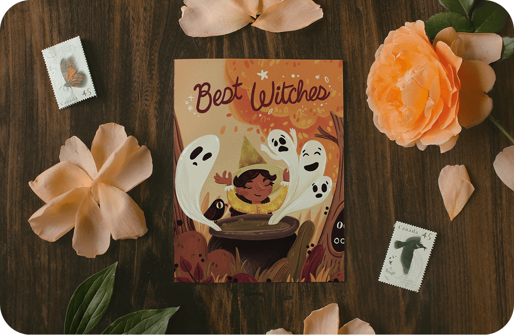 Best Witches greeting card surrounded by flowers