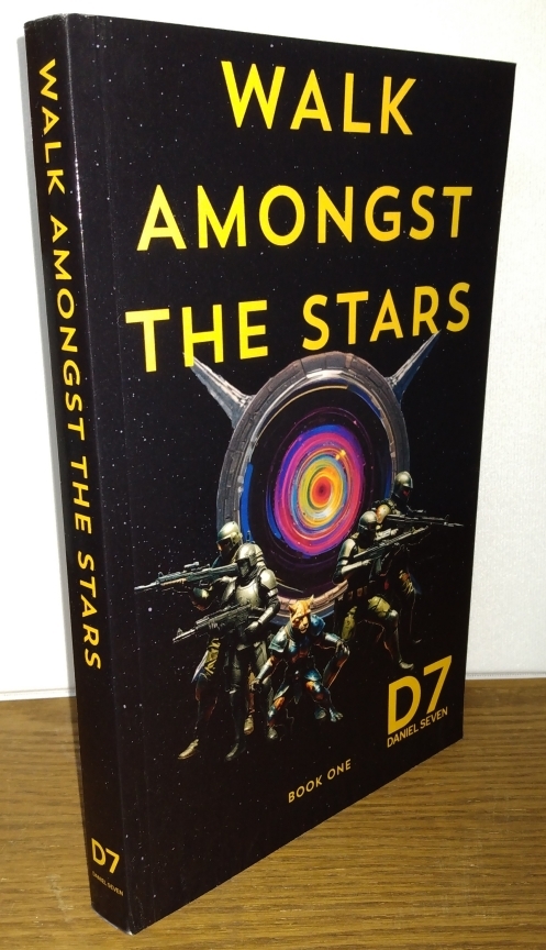 A white book named Work In Progress in front of an artistic background.