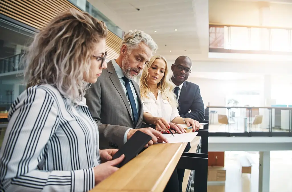 business team reviewing bank documents