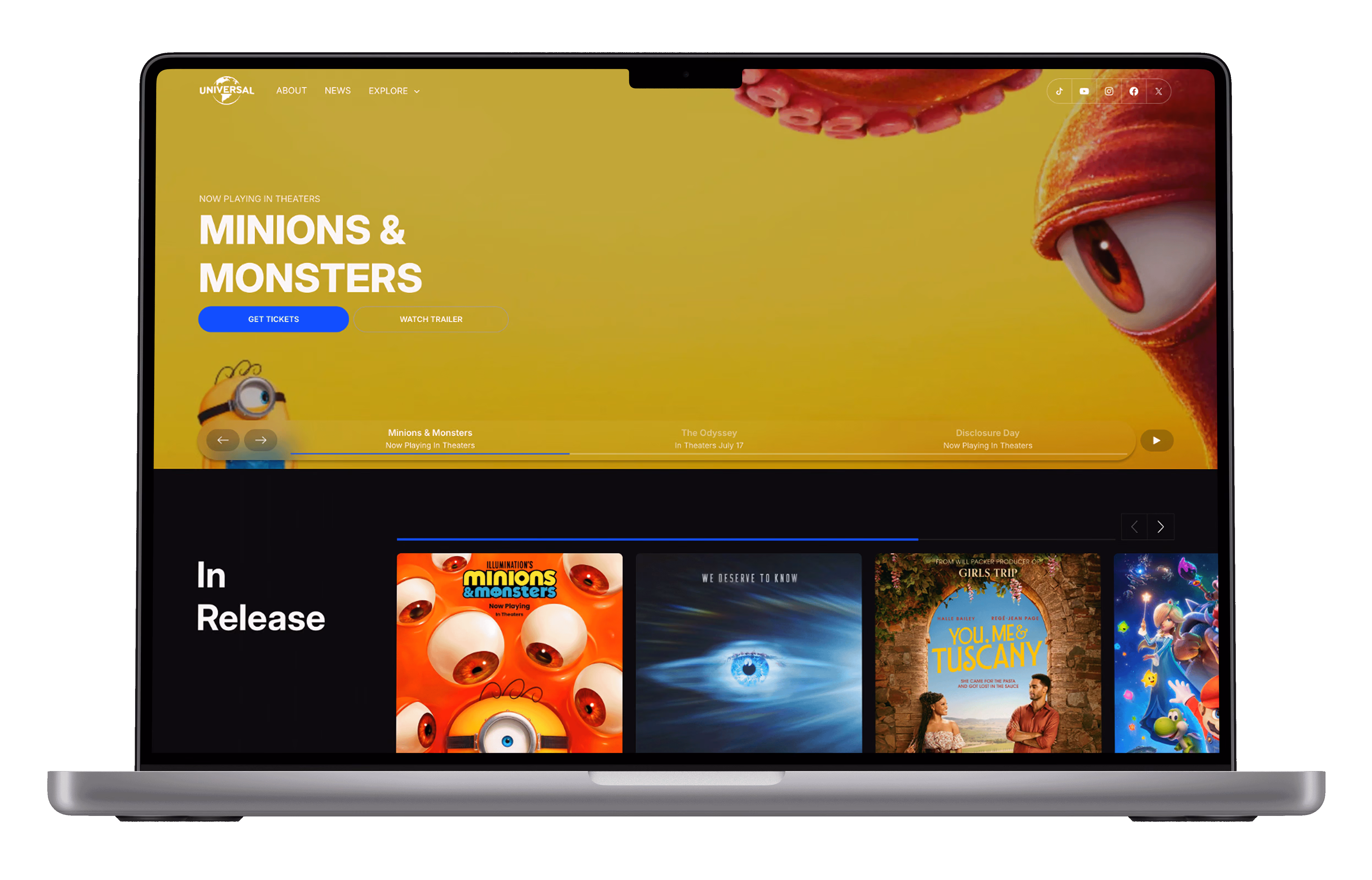 Entertainment content platform on laptop with movie promotions, ticketing interface and mobile offer screen