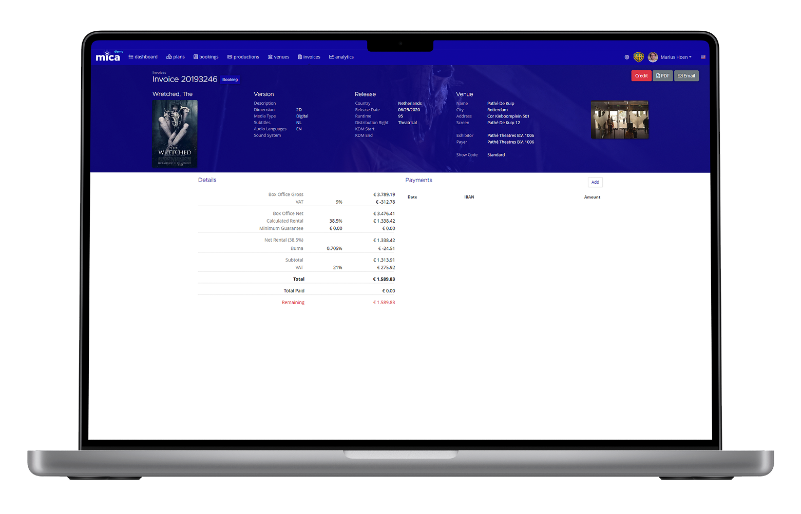 Cinema invoicing and financial management dashboard on laptop with revenue charts and account data