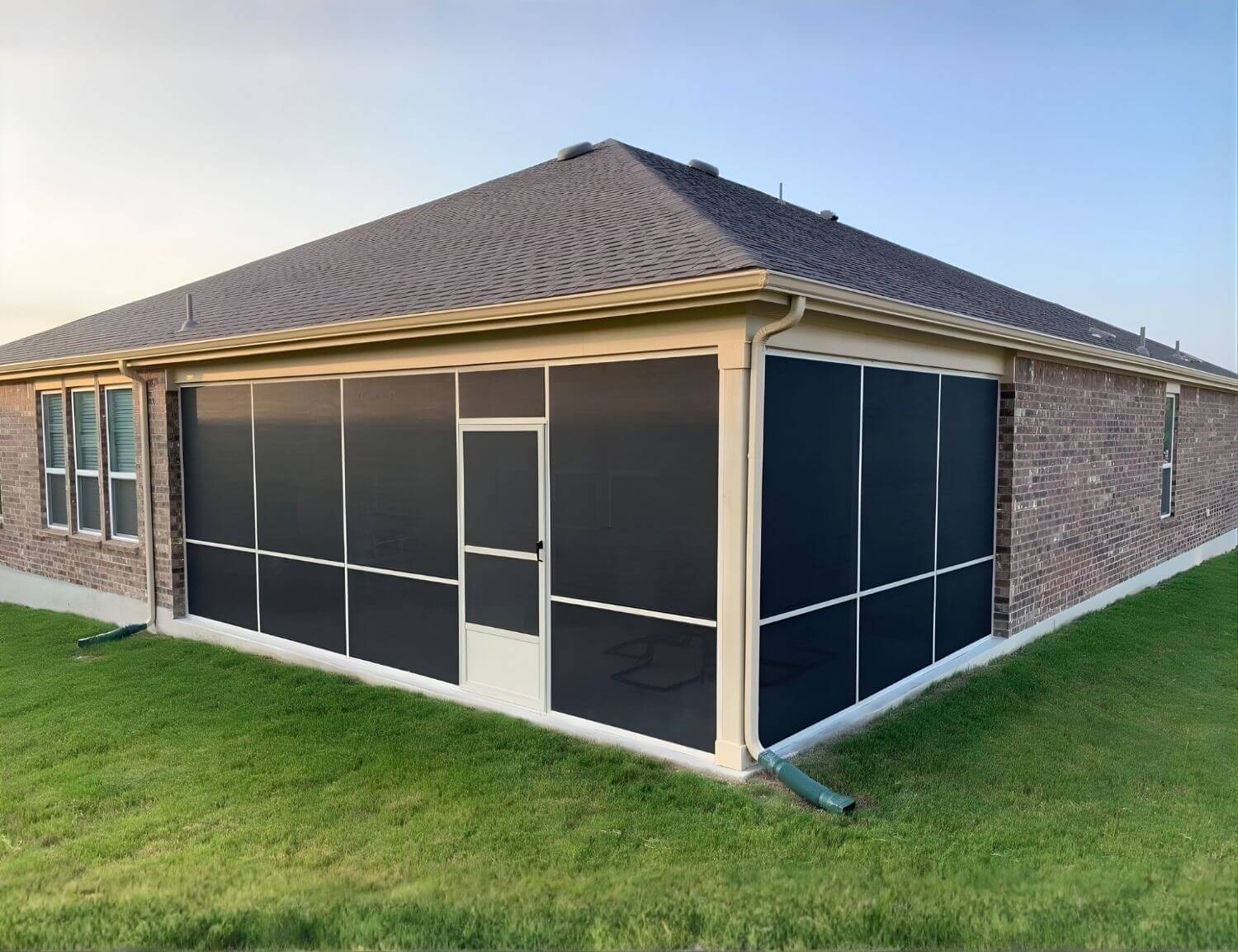 a medium sized screened in patio in san antonio with black mesh screens