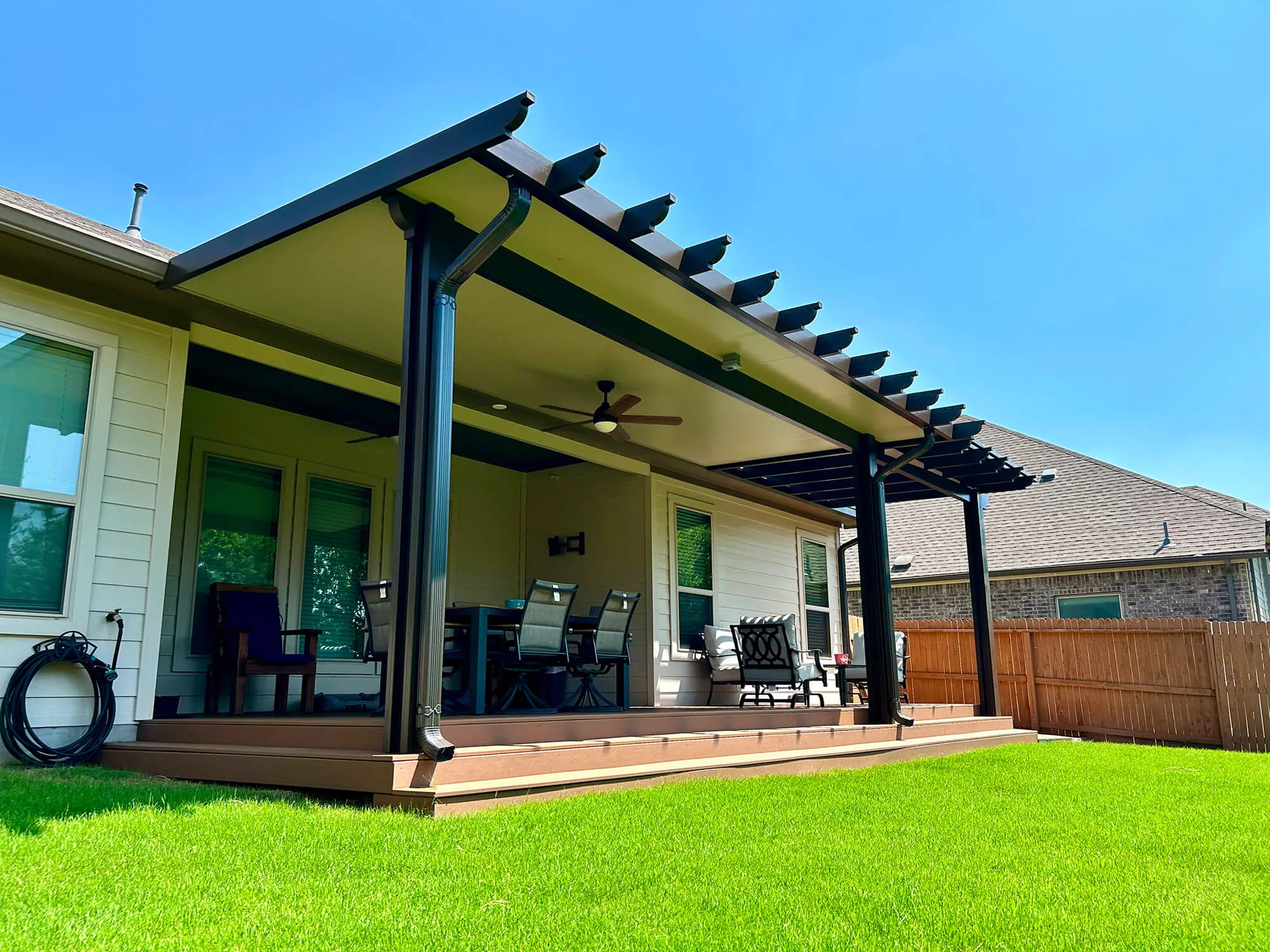 Patio cover with pergola in San Antonio backyard.
