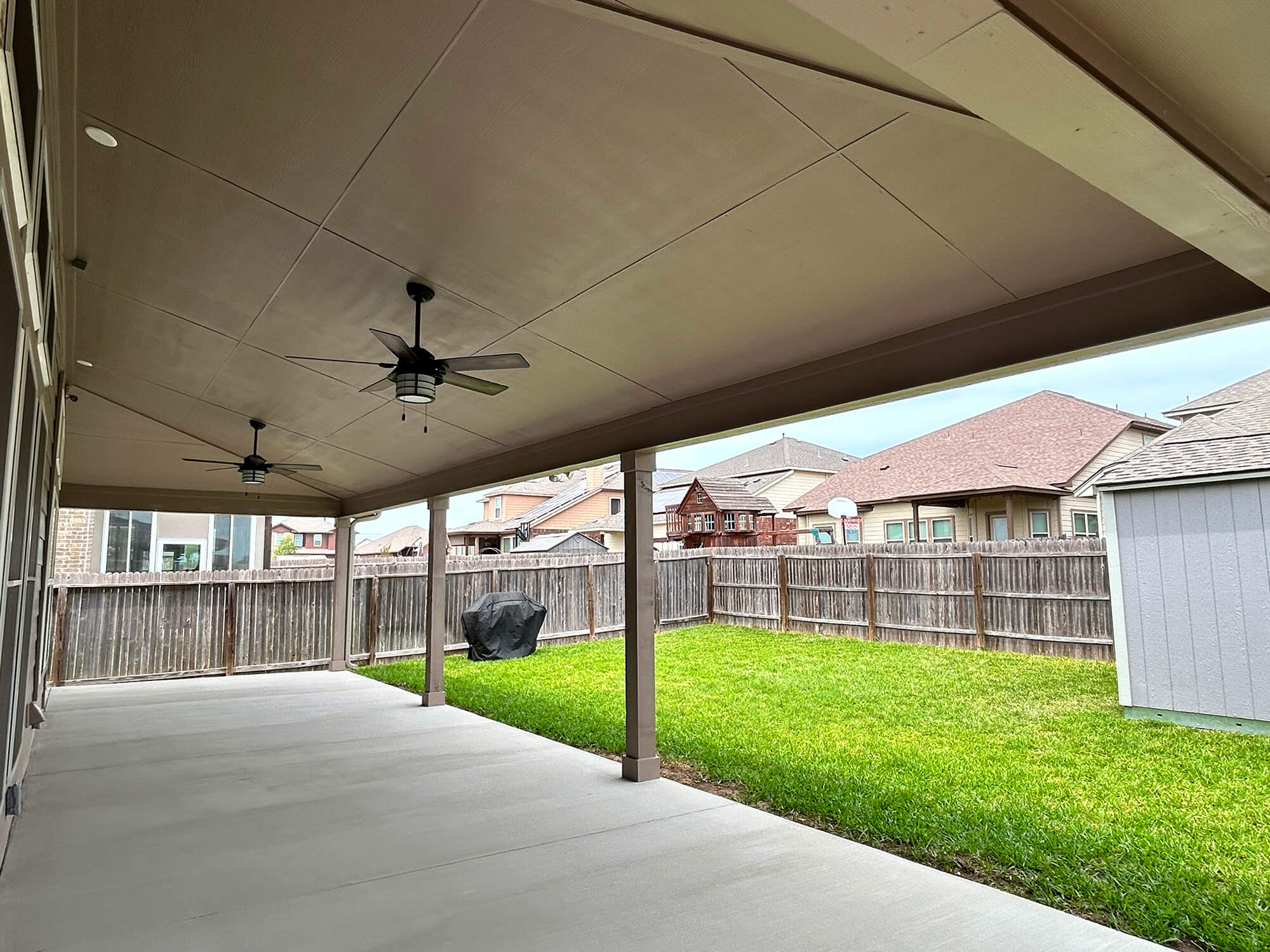 Covered patio with fans, San Antonio backyard.