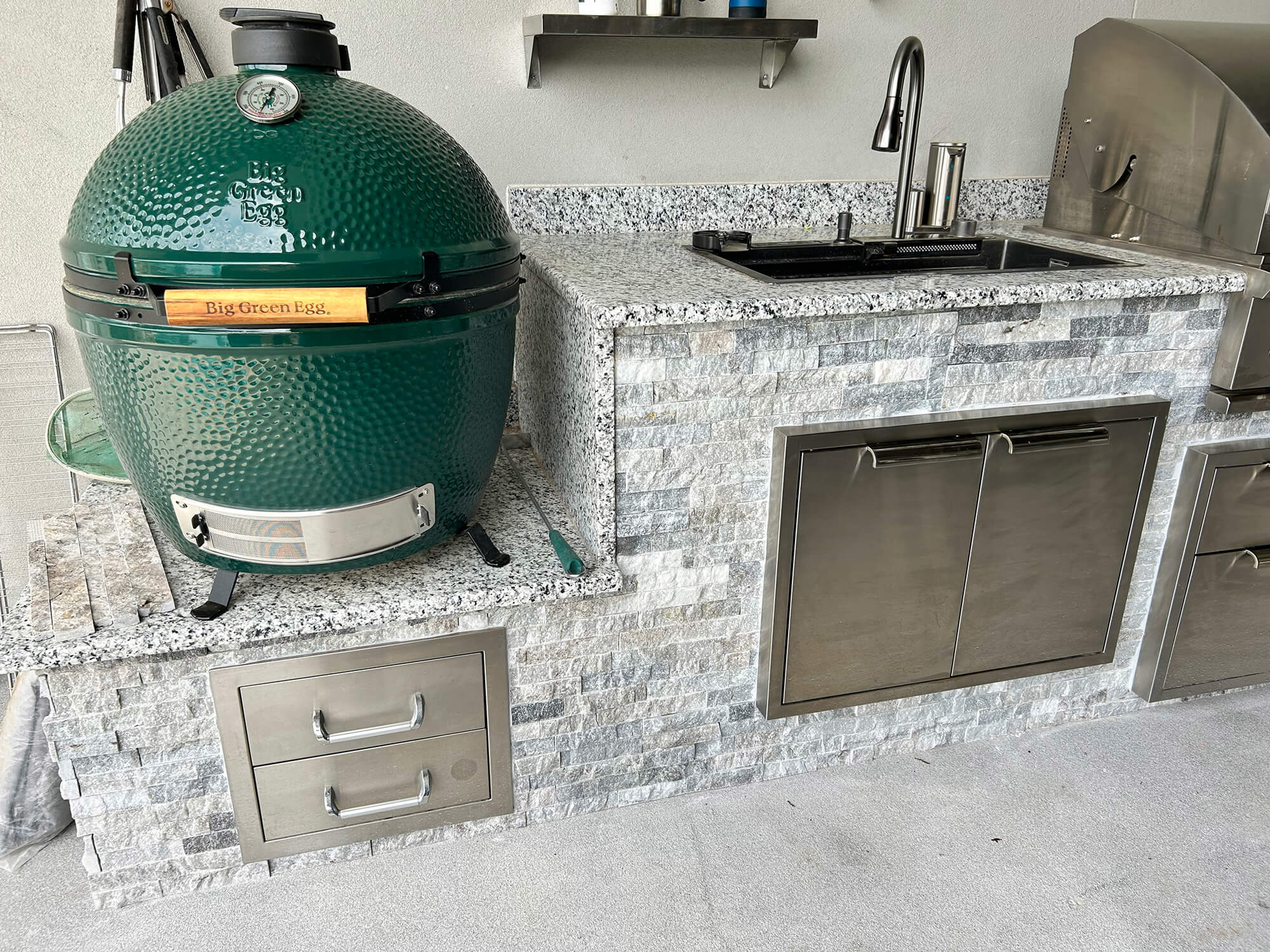 Outdoor kitchen with Big Green Egg grill in San Antonio.