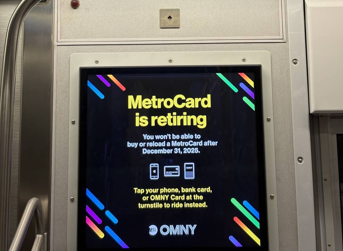 MetroCard retiring sign on the subway