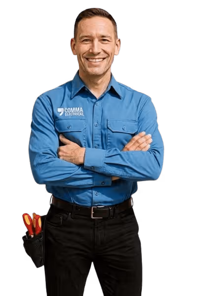 Comma Electrical Electrician Standing Next To Service Vehicle