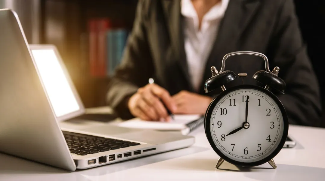 Sales rep responding to inbound lead immediately on laptop at desk