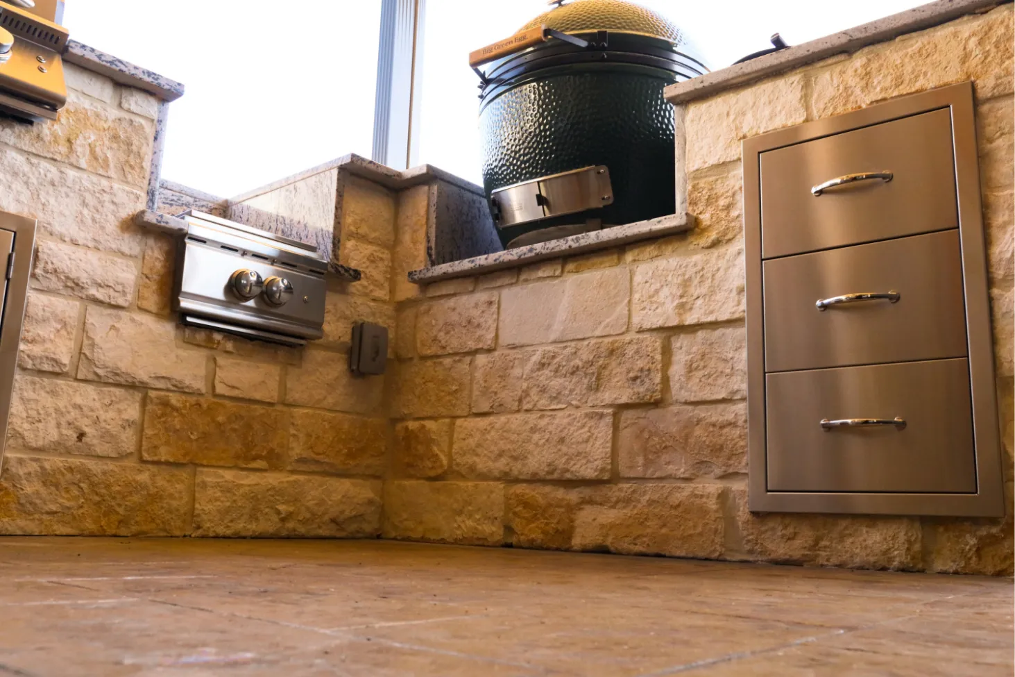 ground level view of a outdoor kitchen in monticello park texas