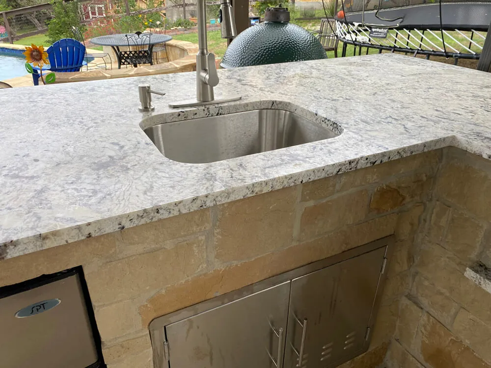 white marble with stainless steel sink