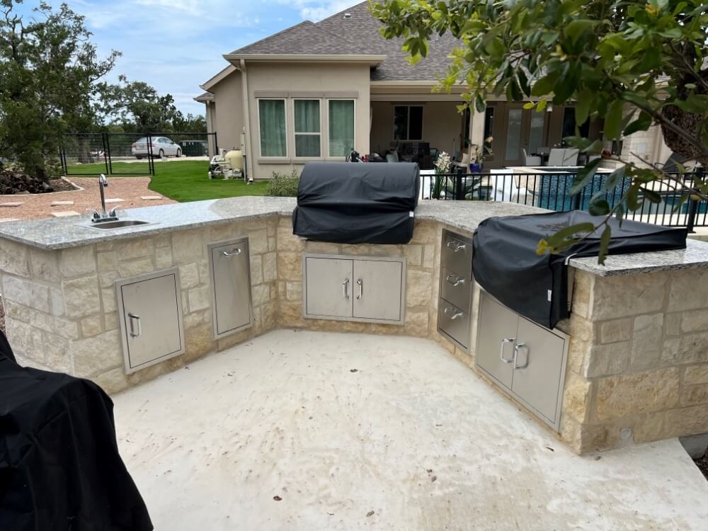 outdoor kitchen with stainless steel appliances