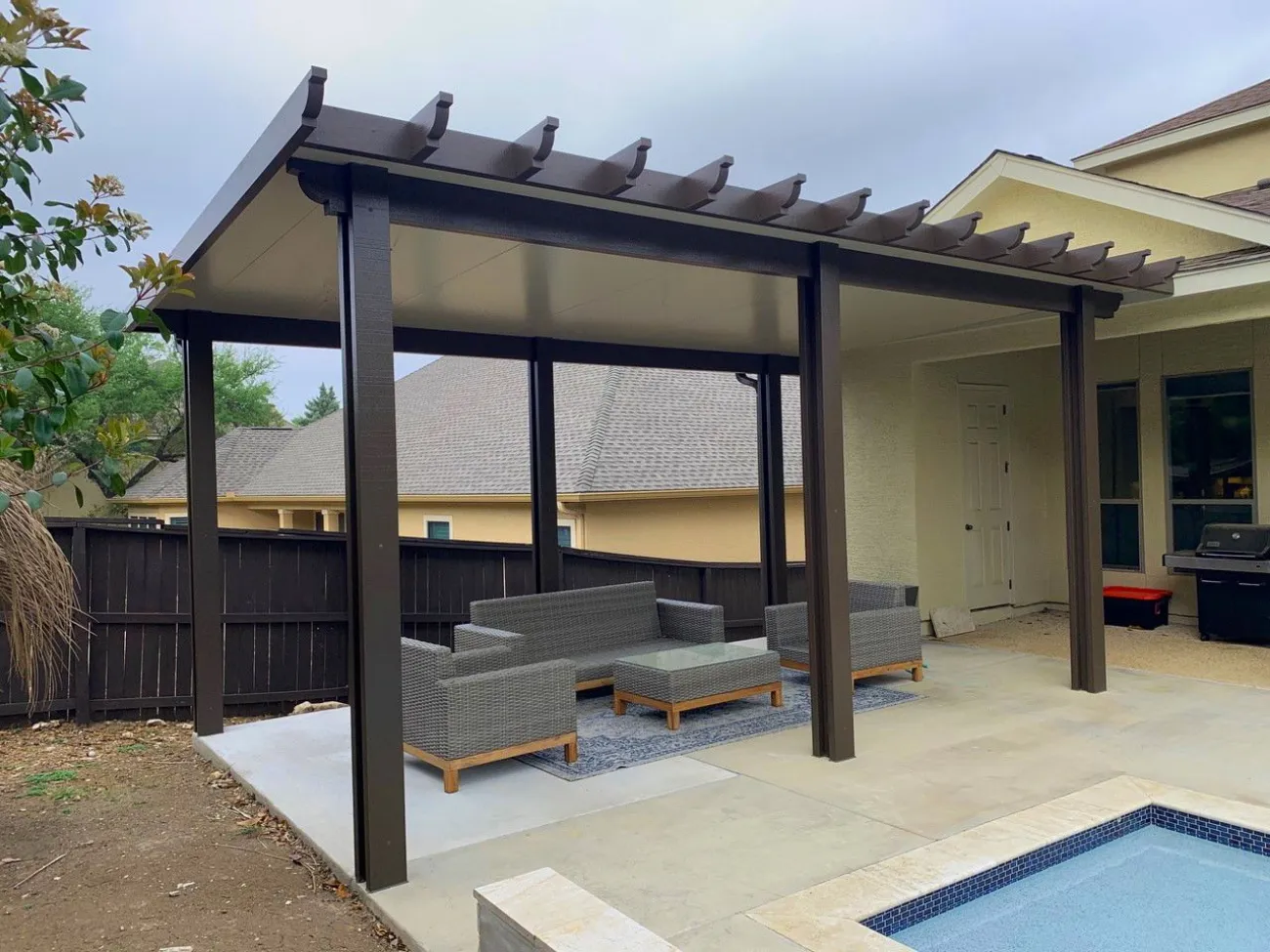 black pergola in woodlawn lake texas