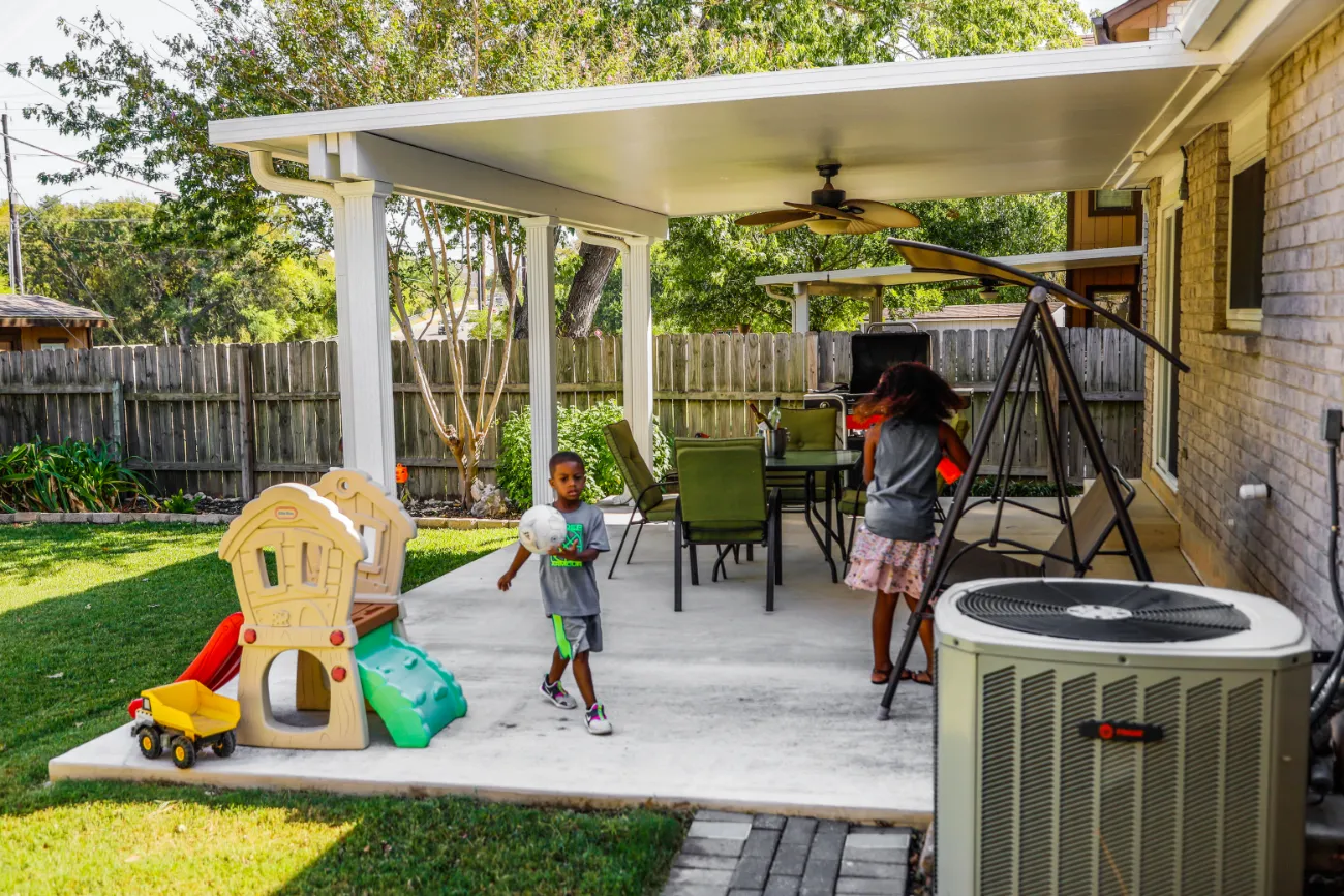 white patio cover with white one level deck