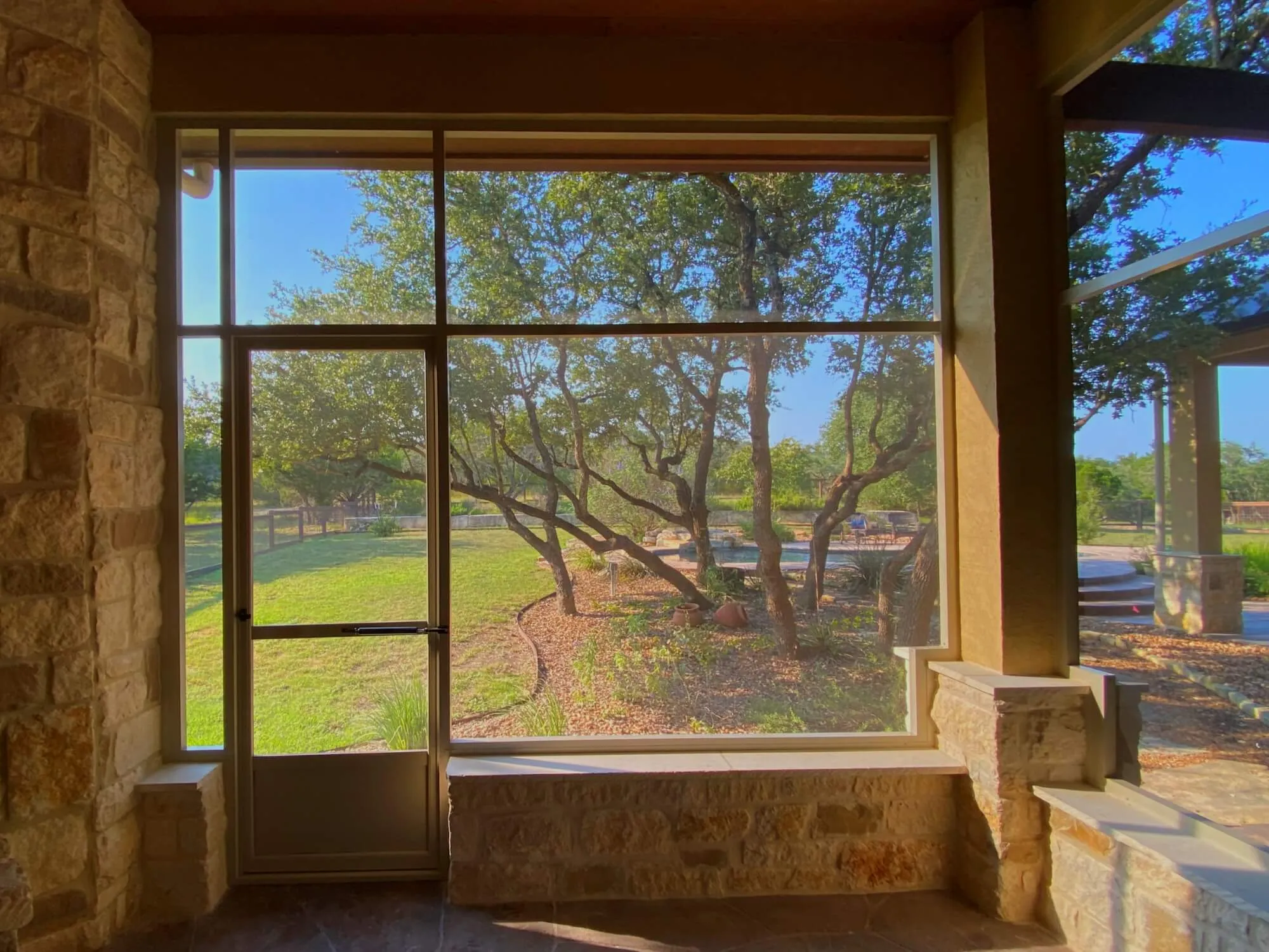 inside a red brick patio enclosure