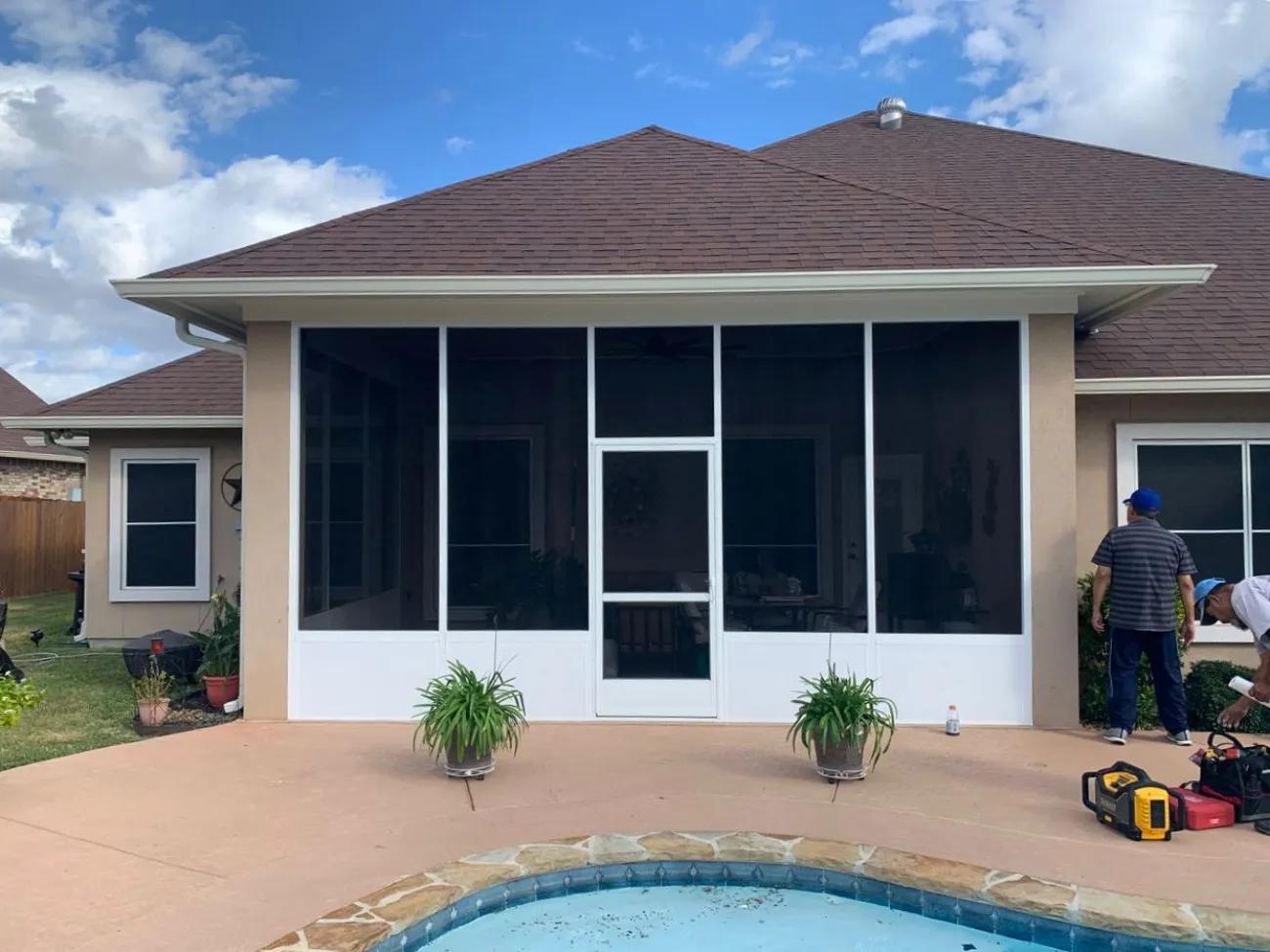 Screened patio enclosure in backyard, San Antonio.