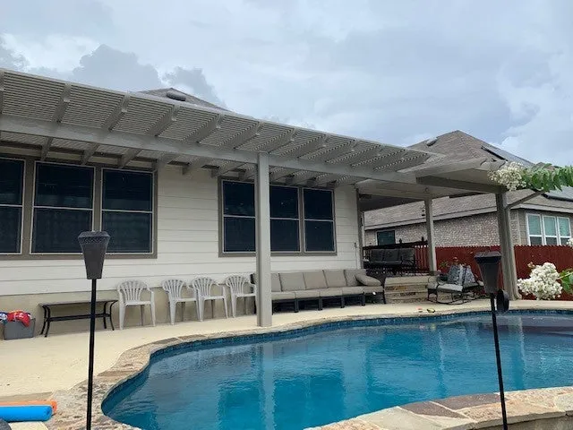 Pergola and patio near pool, San Antonio home.