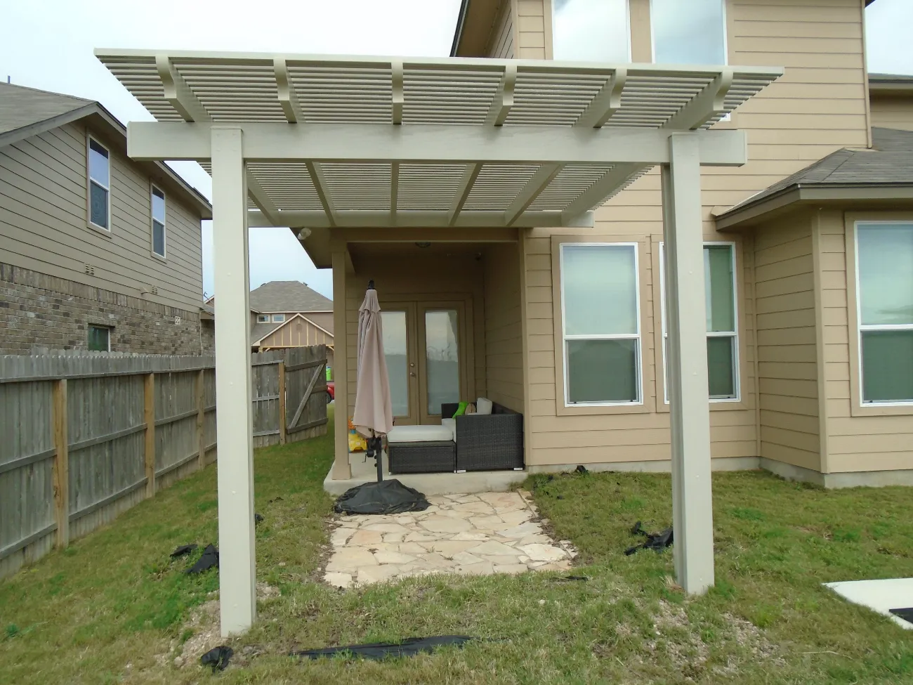 pergola adjacent to a patio in san antonio