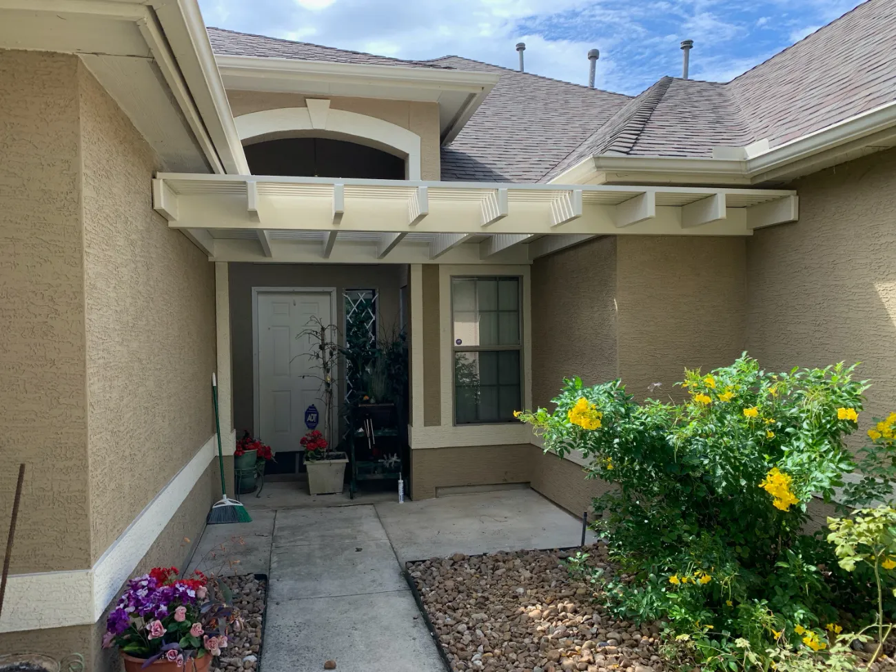 patio cover in front of a home in lavaca texas